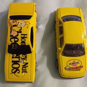 2002 Golden Wheel and 2004 Hot Wheels car